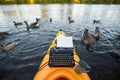 Kayak with a typewriter Royalty Free Stock Photo