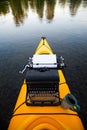 Kayak with a typewriter Royalty Free Stock Photo