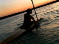 Kayaker against sunset Royalty Free Stock Photo
