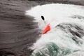 Kayaker in white water paddling breaking waves Royalty Free Stock Photo