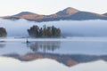The kayaker at Chittenden Reservoir in the Fog Royalty Free Stock Photo