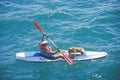 Kayaker and Dog in Water
