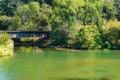 Kayaker Going Under Train Trestle on Roanoke River