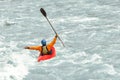 Kayaker having fun in white water rapids, with copy space Royalty Free Stock Photo
