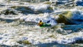 Kayaker navigating through the White Waters of the Thompson River