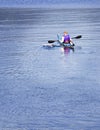 Kayaker paddling on lake Royalty Free Stock Photo