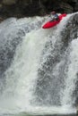 Kayaker in the waterfall