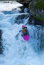 Kayaker on the waterfall in Norway