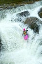 Kayaker on the waterfall in Norway Royalty Free Stock Photo