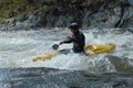 Kayaker in a wild stream Royalty Free Stock Photo