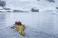 Kayakers in antarctic region