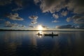 Kayakers on Coot Bay in Everglades National Park under dramatic sunset clouds. Royalty Free Stock Photo