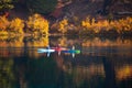 Kayakers enjoying the autumn colors.