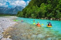 Kayakers exercising and rowing on the Soca river, Bovec, Slovenia