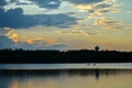 Kayakers on Lake at Sunset