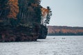 Kayakers make their way through the sea caves at the Apostle Islands National Lakeshore in Wisconsin Royalty Free Stock Photo