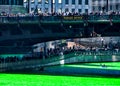 Kayakers paddle along the Chicago River, which is dyed green for St. Patrick`s day