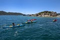 Kayakers paddle through the Mediterranean Sea off the coast of Turkey at Kalekoy. Royalty Free Stock Photo