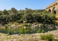 Kayakers on the River below Pont du Gard in France Royalty Free Stock Photo