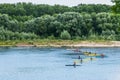 Kayakers rowing in colorful kayaks on river Sozh. Royalty Free Stock Photo