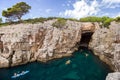 Kayakers at a sea cave in Croatia Royalty Free Stock Photo