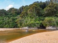 Kayakers in shallow river. Royalty Free Stock Photo