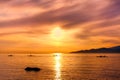 Kayakers Silhouette On Ocean During Orange Sunset Royalty Free Stock Photo