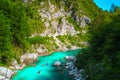 Kayakers on the spectacular turquoise Soca river, Kobarid, Slovenia
