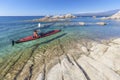 Kayaking along beautiful mediterranean coast