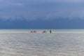 Kayaking in the azure sea at the stormy blue sky background in Koh Samui island, Thailand Royalty Free Stock Photo