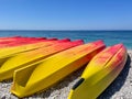 Kayaking on the Beach Concept Photo. Sport Kayak on the Rocky Beach. Royalty Free Stock Photo