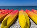 Kayaking on the Beach Concept Photo. Sport Kayak on the Rocky Beach. Royalty Free Stock Photo