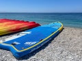 Kayaking on the Beach Concept Photo. Sport Kayak on the Rocky Beach. Royalty Free Stock Photo