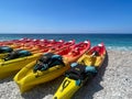 Kayaking on the Beach Concept Photo. Sport Kayak on the Rocky Beach. Royalty Free Stock Photo