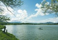 Kayaking on Beck Lake in Cody, Wyoming with Heart Mountain in the background. Royalty Free Stock Photo