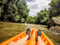 Kayaking on broad river in the mountains Royalty Free Stock Photo