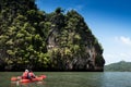 Kayaking exploring Rock island of Koh Talabeng near Koh Lanta, K