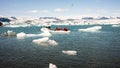 kayaking in Iceland next to glacier iceberg Royalty Free Stock Photo