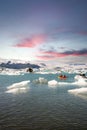 kayaking in Iceland next to glacier iceberg Royalty Free Stock Photo