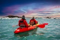 kayaking in Iceland next to glacier iceberg Royalty Free Stock Photo