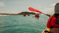 kayaking in Iceland next to glacier iceberg Royalty Free Stock Photo