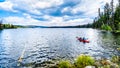 Kayaking on Lac Le Jeune lake near Kamloops, British Columbia, Canada