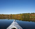 Kayaking on a Northern Lake in Autumn Royalty Free Stock Photo