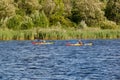 Kayaking on the river in clear weather Royalty Free Stock Photo