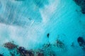 Kayaking in the sea with clear turquoise water. Kayaking, leisure activities on the ocean. Aerial drone bird's eye view of kayak Royalty Free Stock Photo