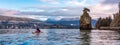 Kayaking at Seawall in Stanley Park. Cloudy Sunrise in Winter. Downtown Vancouver