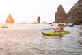 Woman kayak sea. Happy tourist enjoy taking picture outdoors for memories. Woman traveler posing in kayak canoe at sea Royalty Free Stock Photo