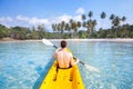 Kayaking on tropical beach, travel to Asia, summer holidays, tourist paddling on kayak