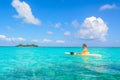 Kayaking in tropical paradise - Canoe floating on transparent turquoise water, caribbean sea, Belize, Cayes islands Royalty Free Stock Photo