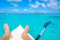 Kayaking in tropical paradise - Canoe floating on transparent turquoise water, caribbean sea, Belize, Cayes islands Royalty Free Stock Photo